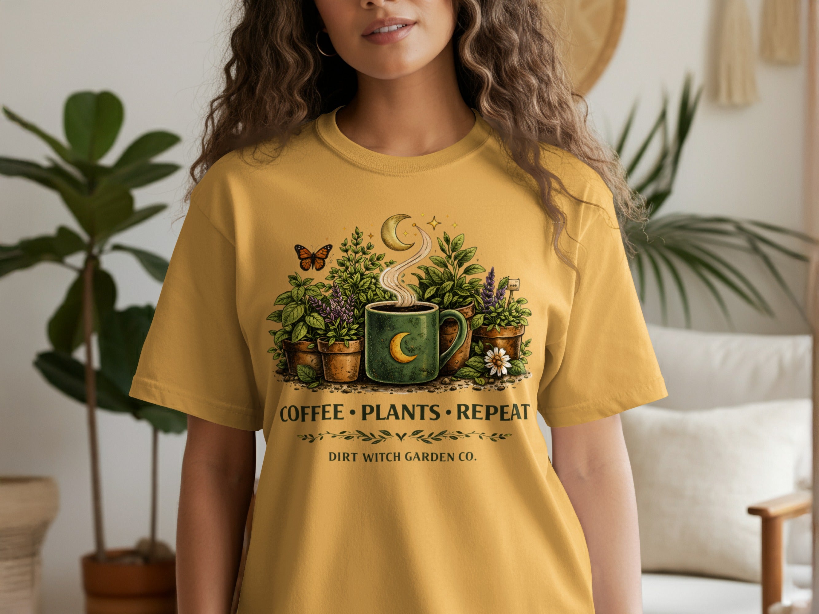 Yellow t-shirt featuring coffee, plants, and crescent moon graphic with "COFFEE PLANTS REPEAT" text.