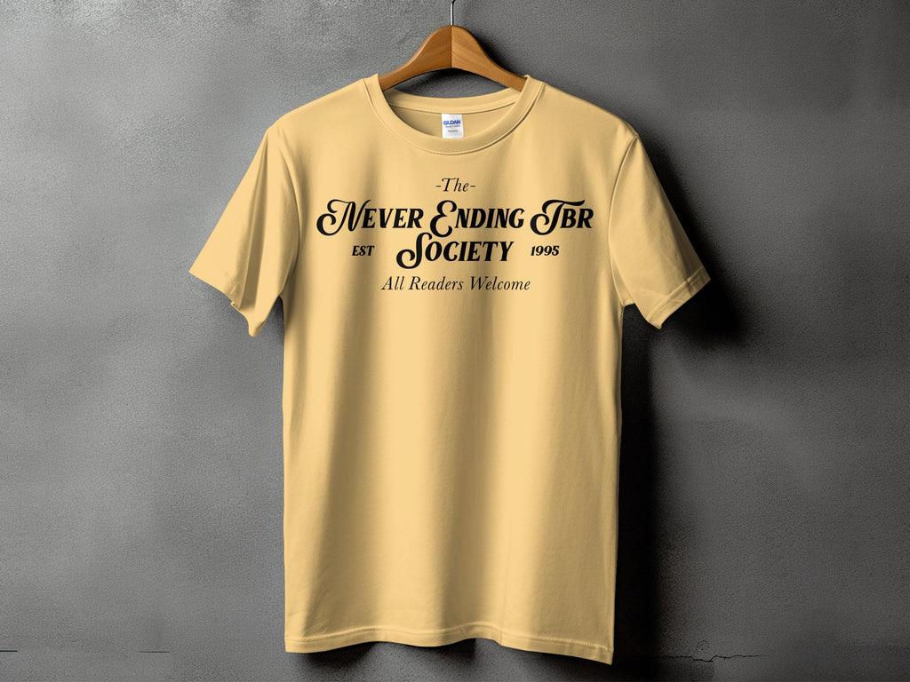 Yellow t-shirt with black text "The Never Ending TBR Society est 1995 All Readers Welcome".