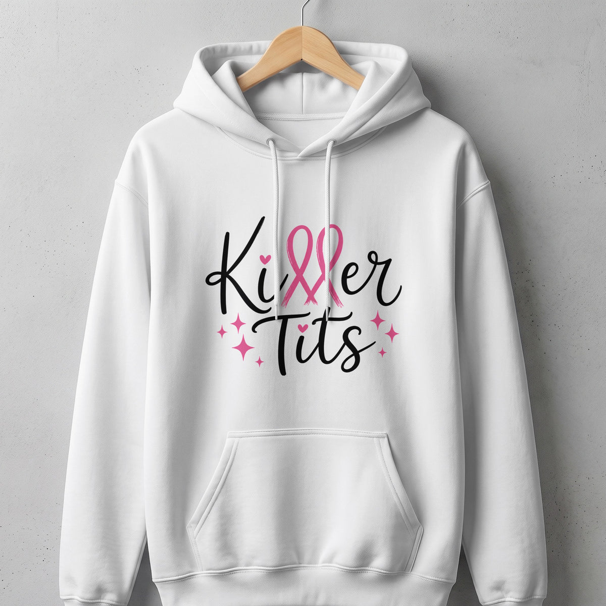 White hoodie with "Killer Tits" text and pink ribbons.