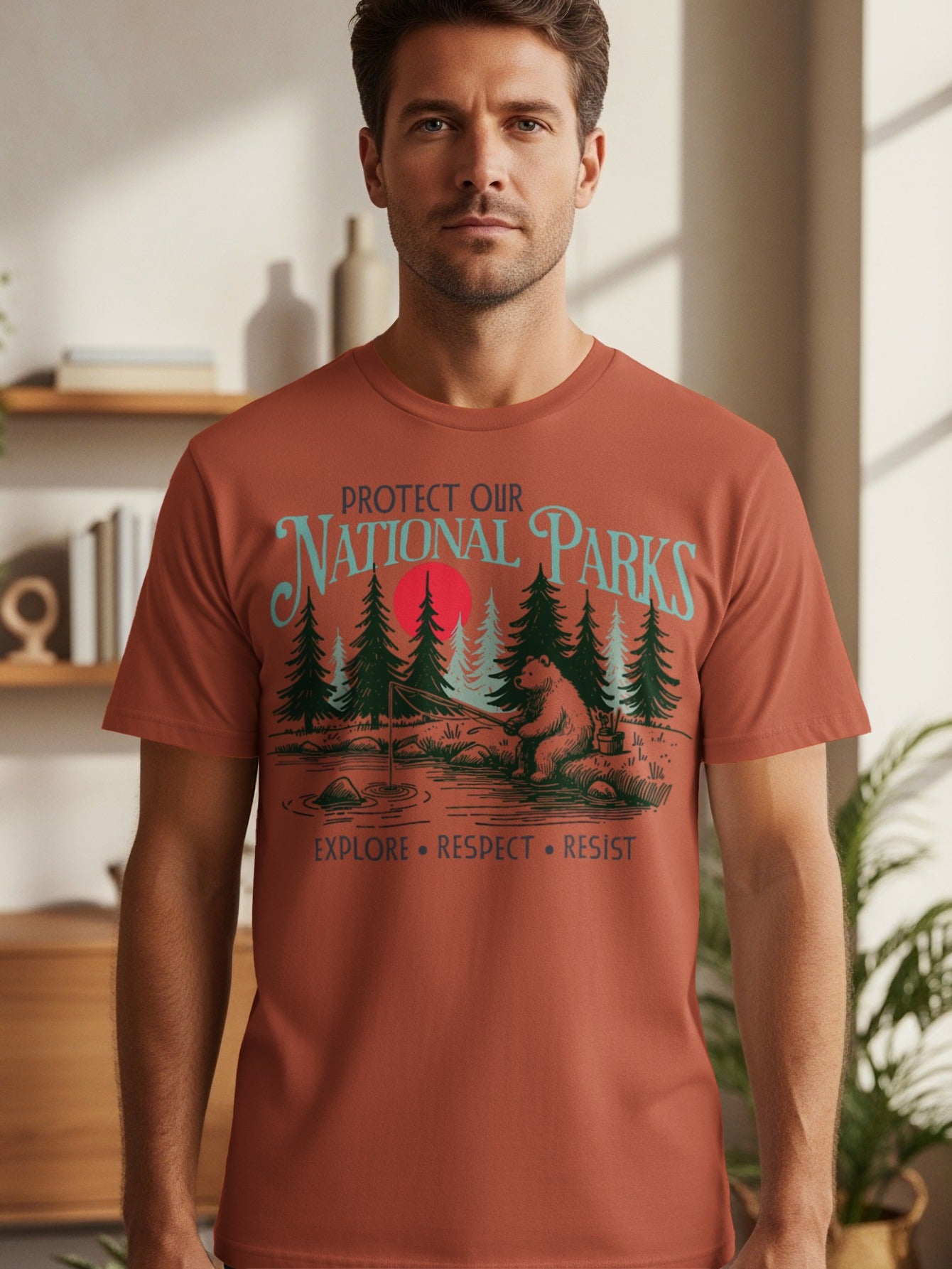 T-shirt with "Protect Our National Parks" text and a bear fishing in a forest scene.