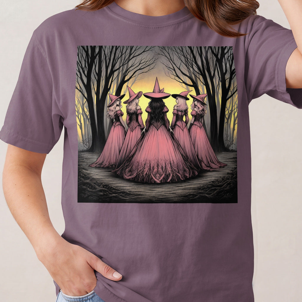 Five witches in pink dresses and hats stand in a dark forest at sunset.