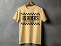 Pale yellow t-shirt with black text that reads "READERS GONNA READ".