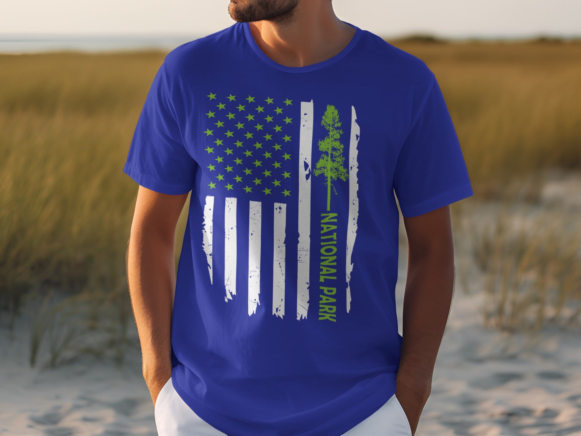 Blue t-shirt with American flag design featuring a tree and "NATIONAL PARK" text.