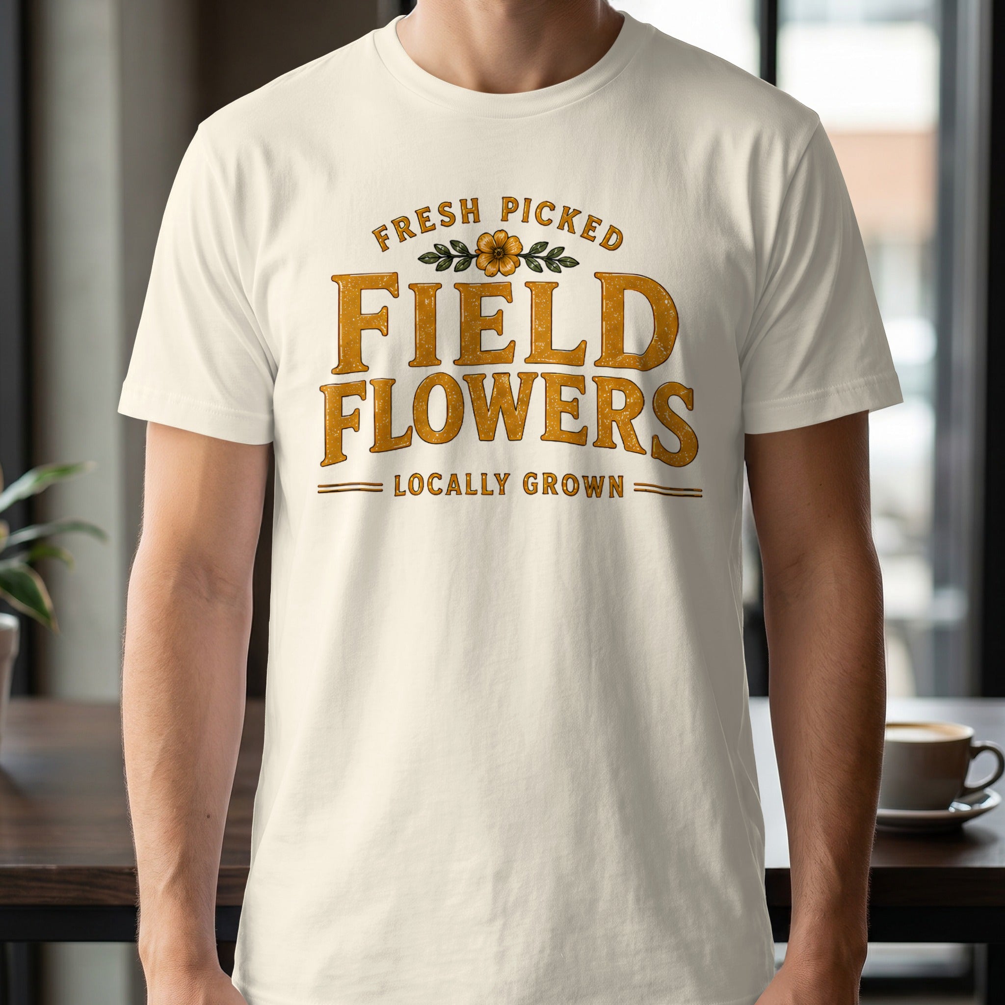 Cream t-shirt with "Fresh Picked Field Flowers Locally Grown" text.