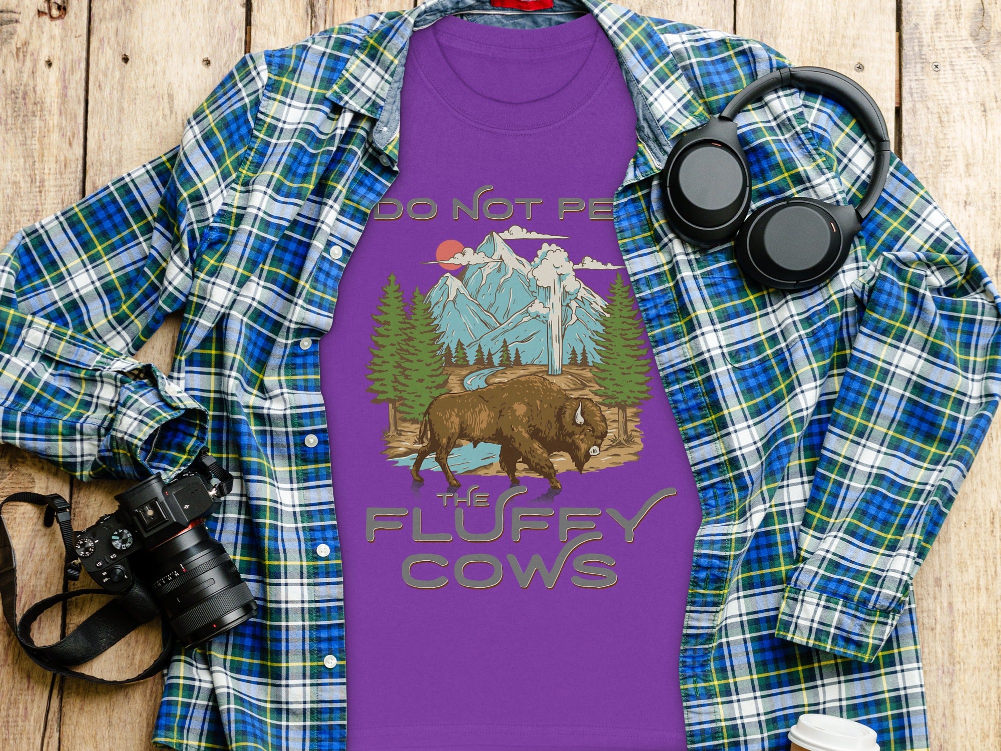 Purple t-shirt with bison artwork and text "DO NOT PE THE FLUFFY COWS".