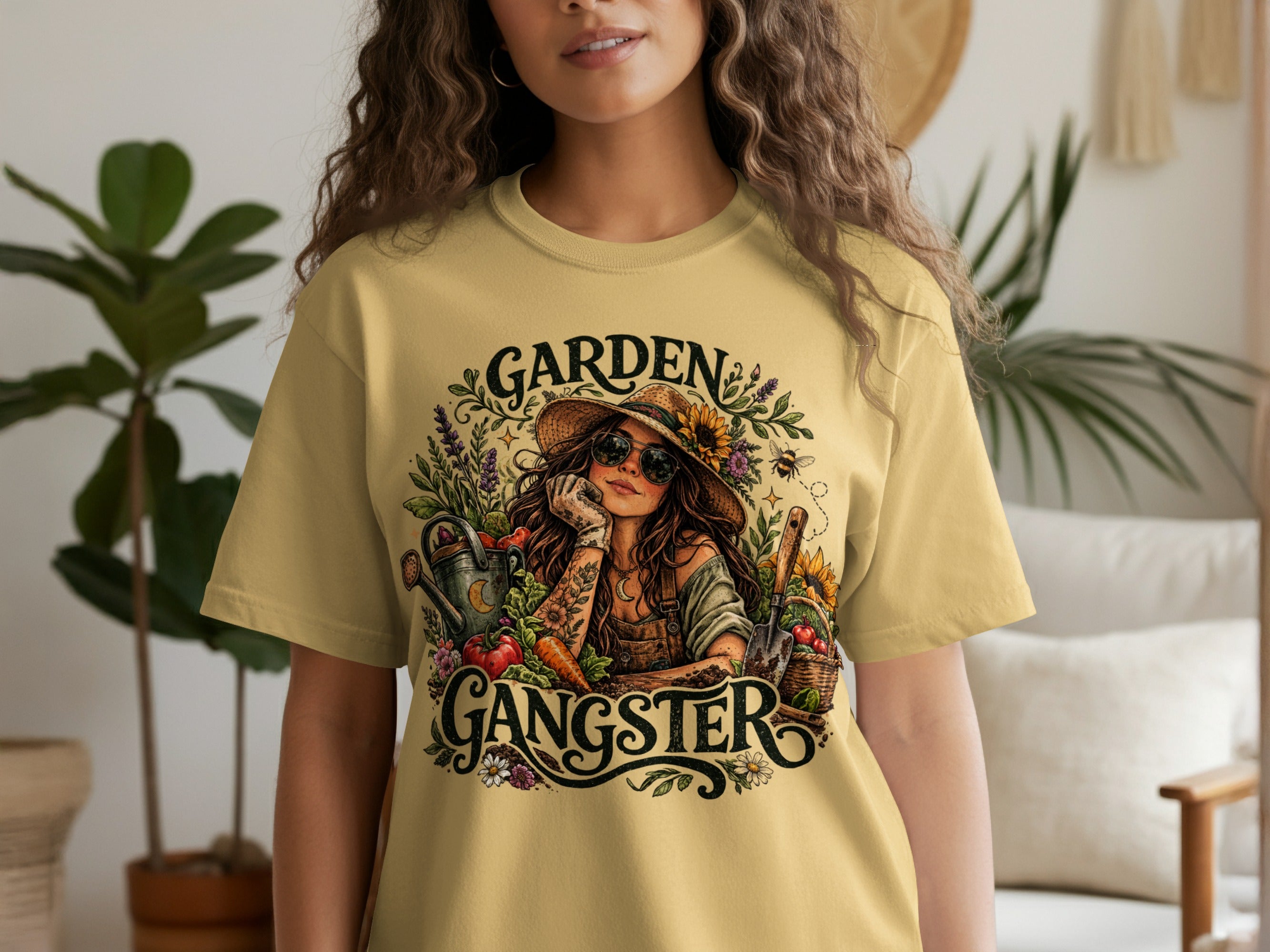 Garden Gangster graphic on a yellow t-shirt featuring a woman with a hat and sunglasses.