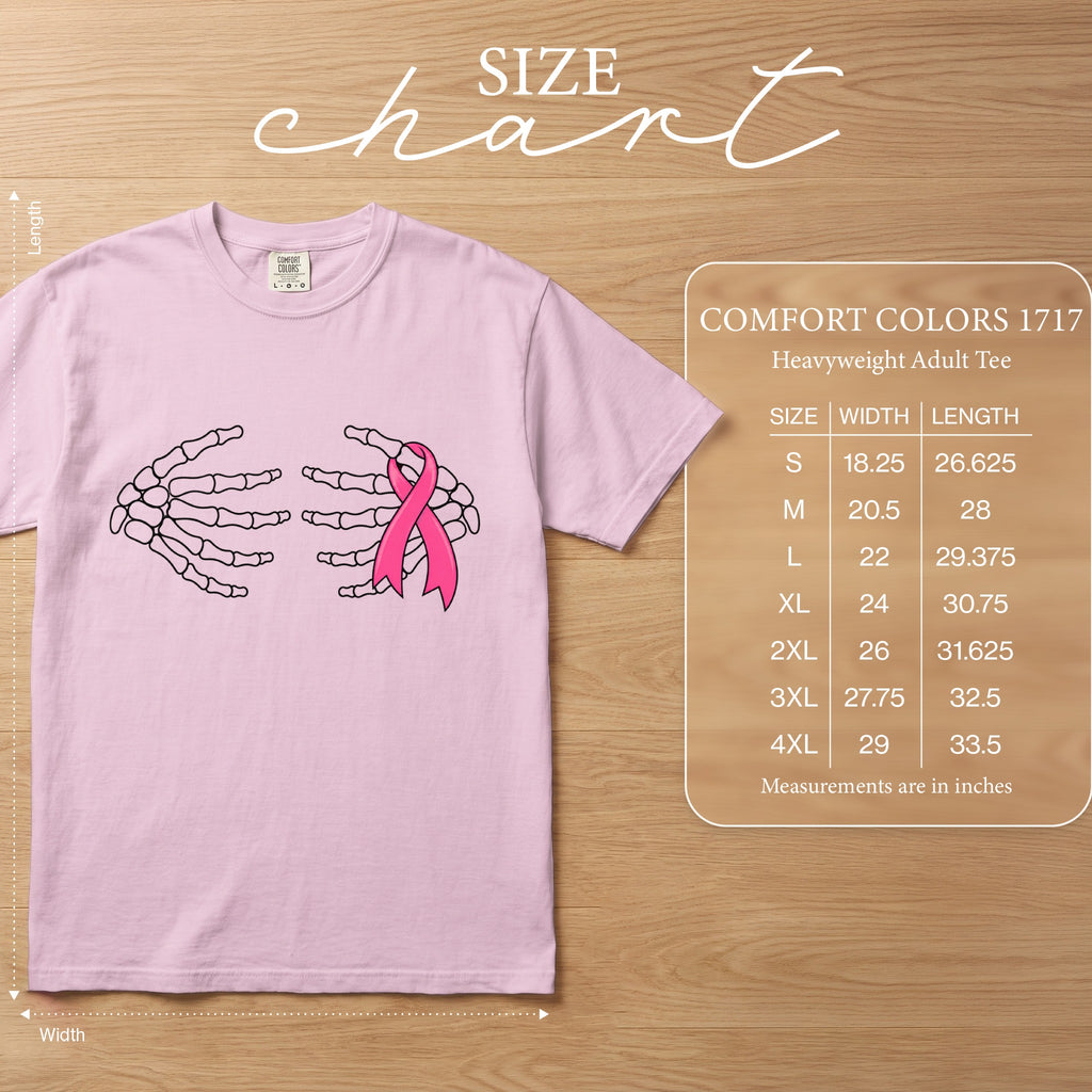 Pink t-shirt with skeleton hands holding a pink ribbon, with size chart.