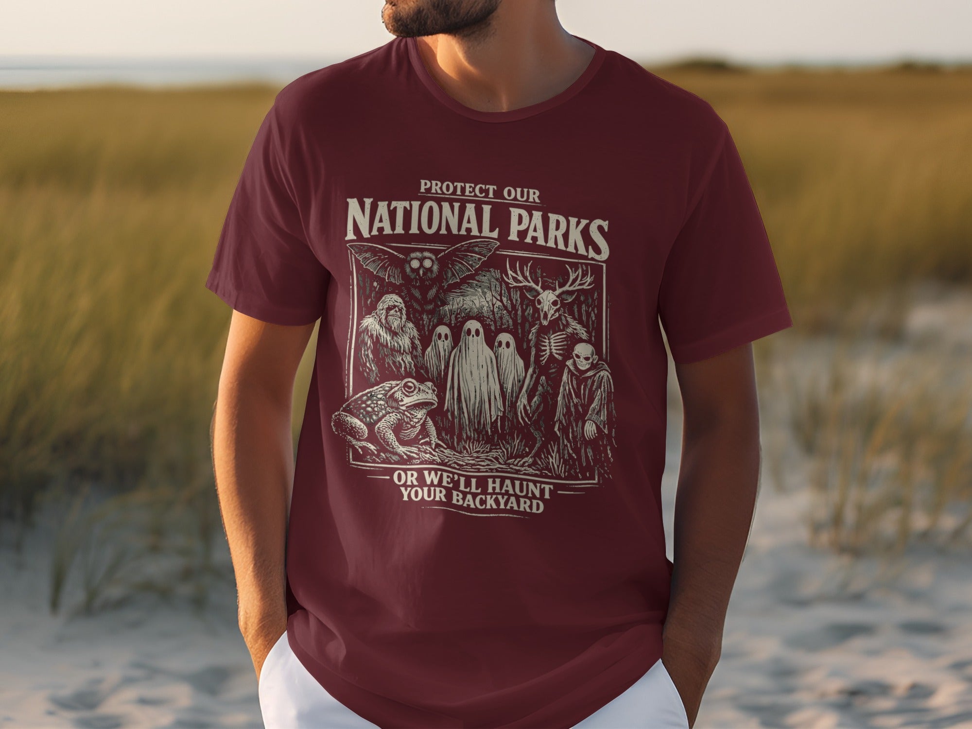 Maroon t-shirt with "Protect Our National Parks, Or We'll Haunt Your Backyard" graphic.