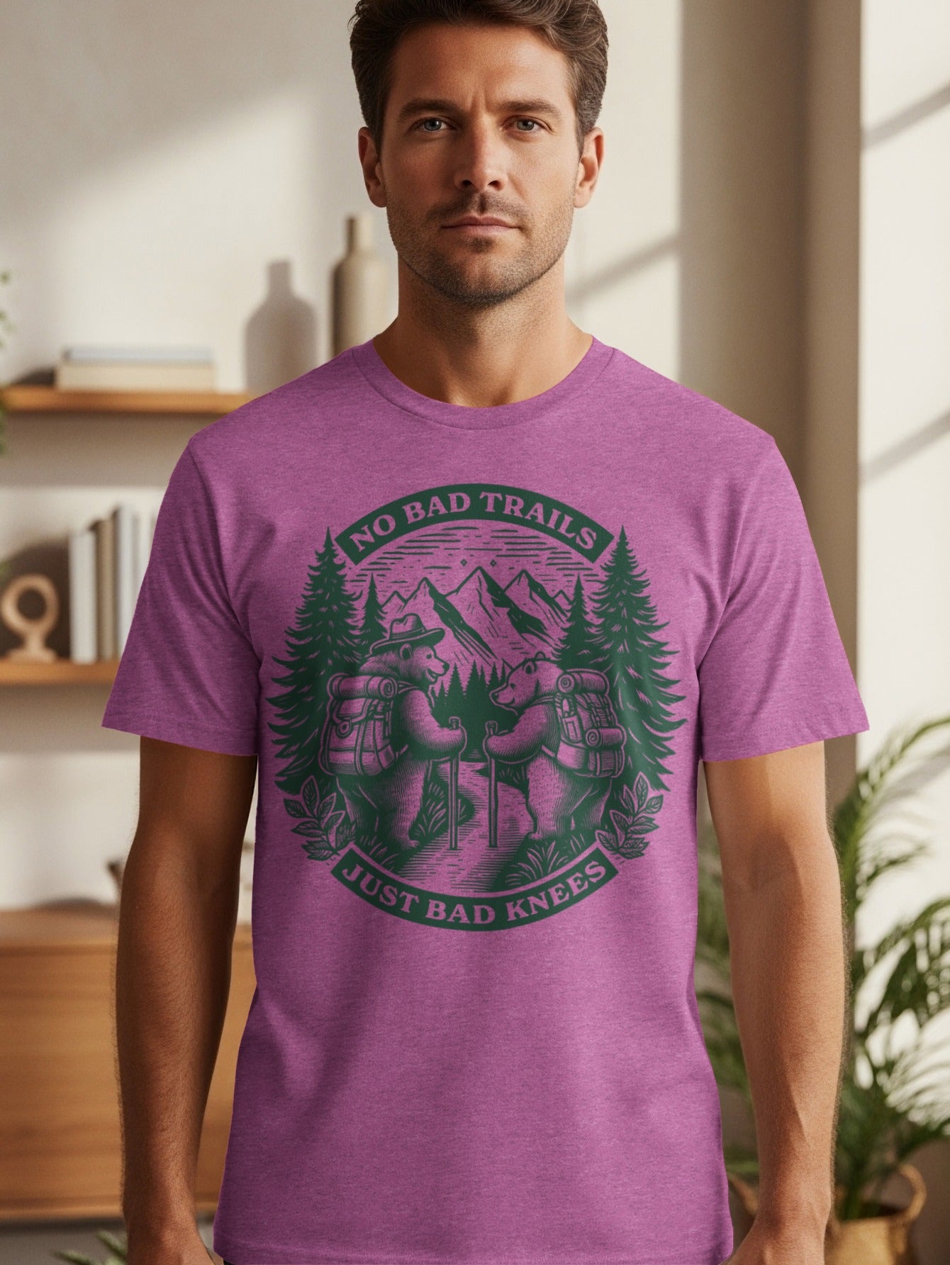 Purple t-shirt with "No Bad Trails Just Bad Knees" bear hiking graphic.