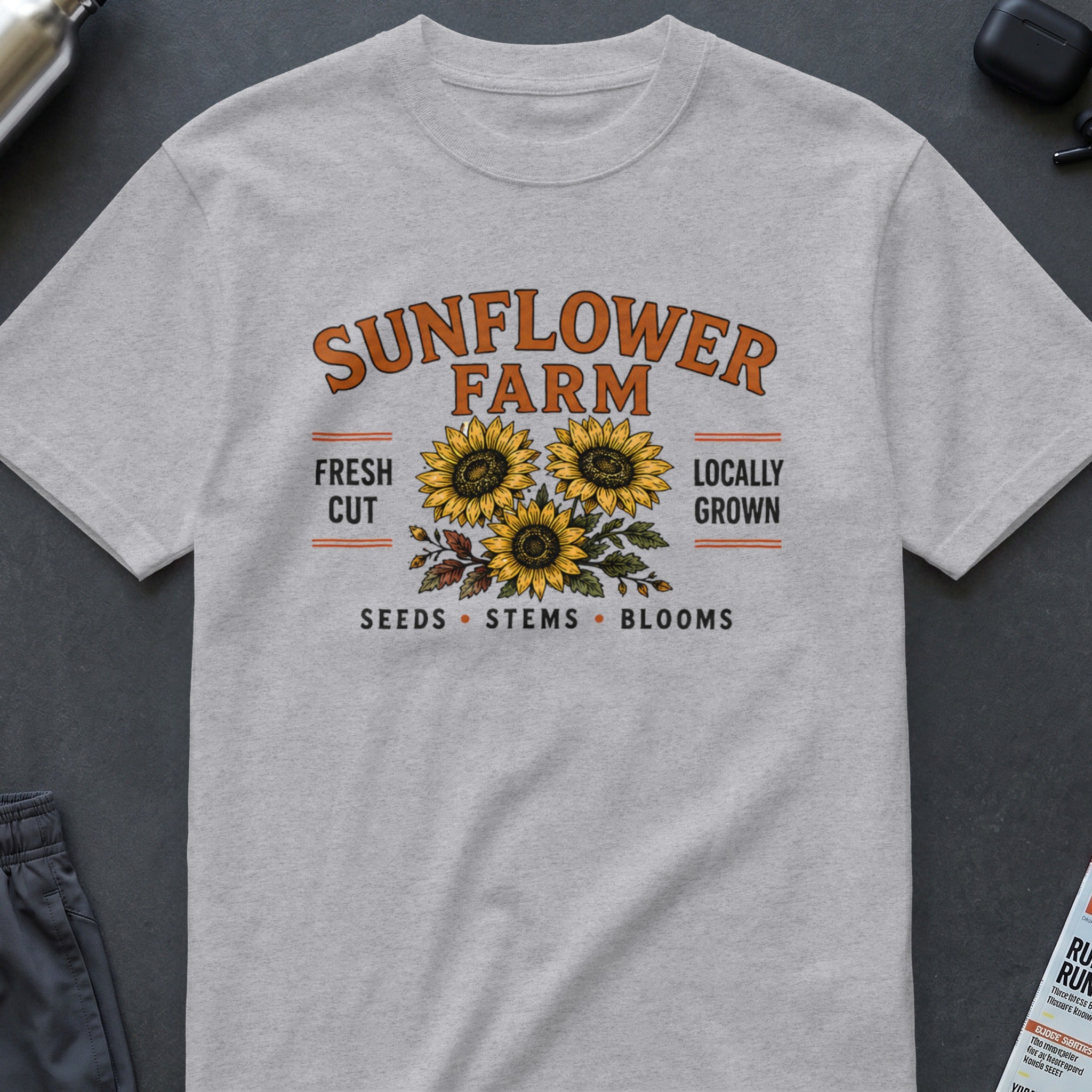 Grey t-shirt with "SUNFLOWER FARM" and sunflowers graphic.