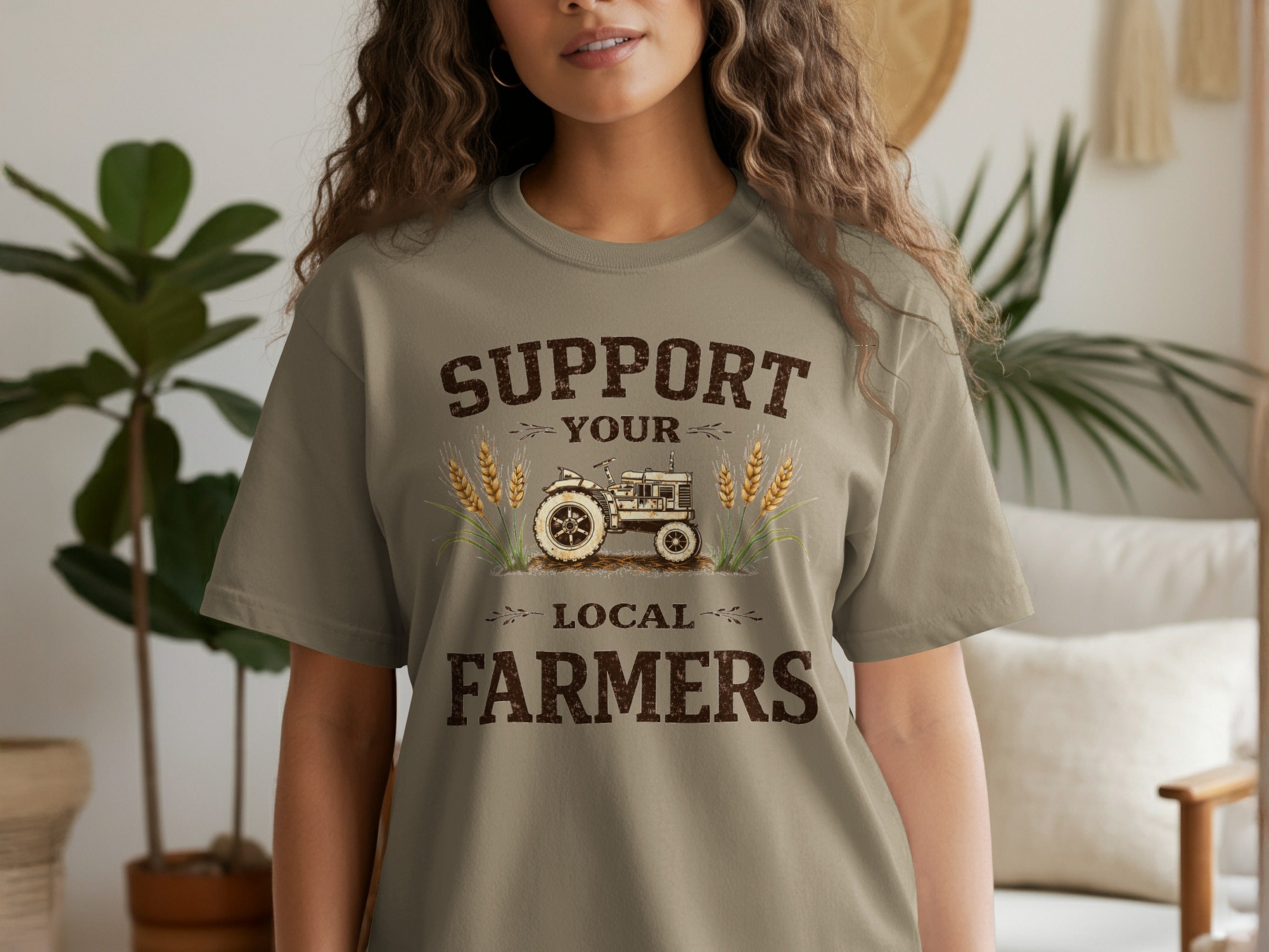 T-shirt with "Support Your Local Farmers" text and vintage tractor graphic.