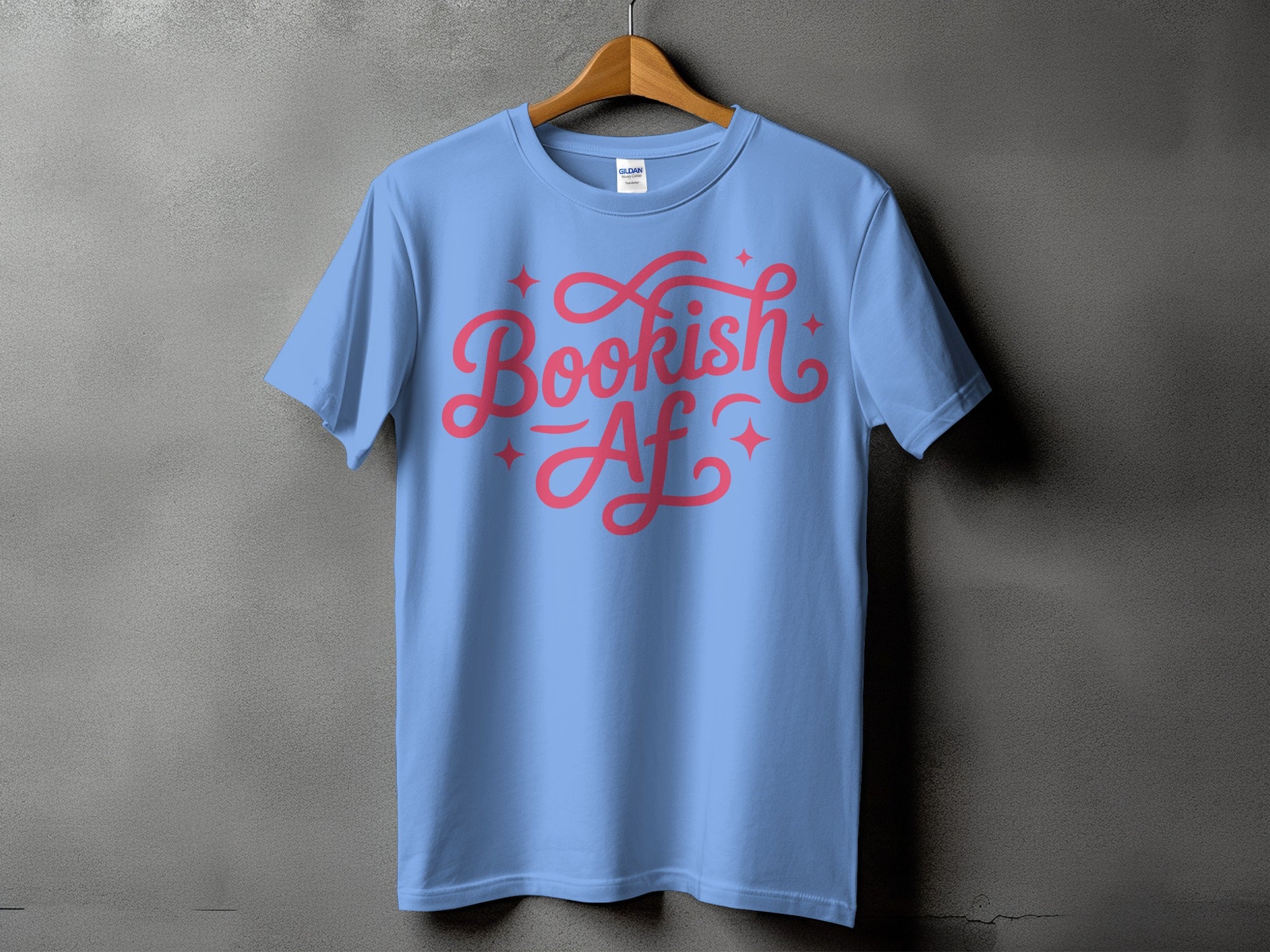Blue t-shirt with "Bookish Af" text and pink stars.