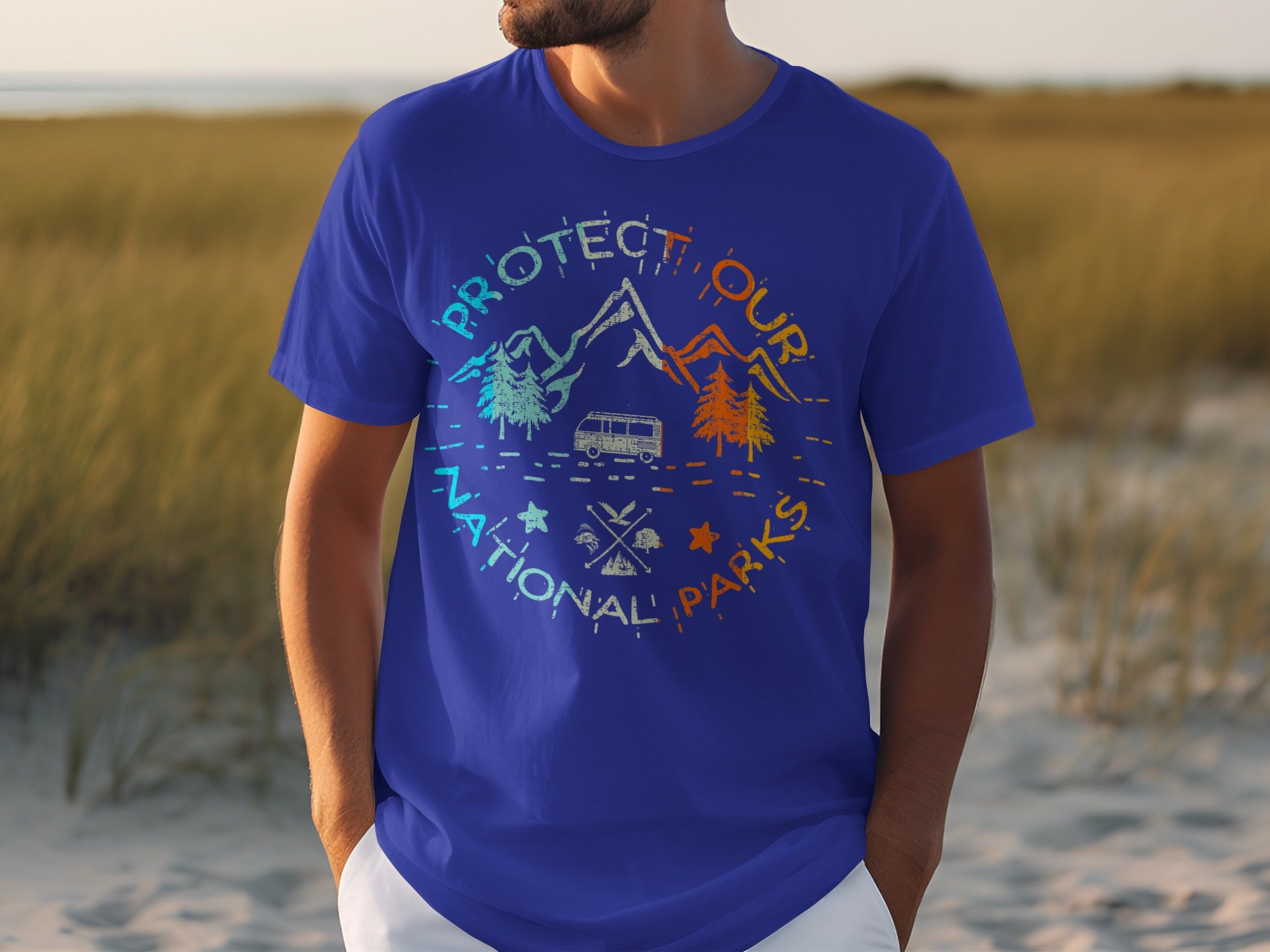Blue t-shirt with "Protect Our National Parks" text and mountain, tree, and van graphic.