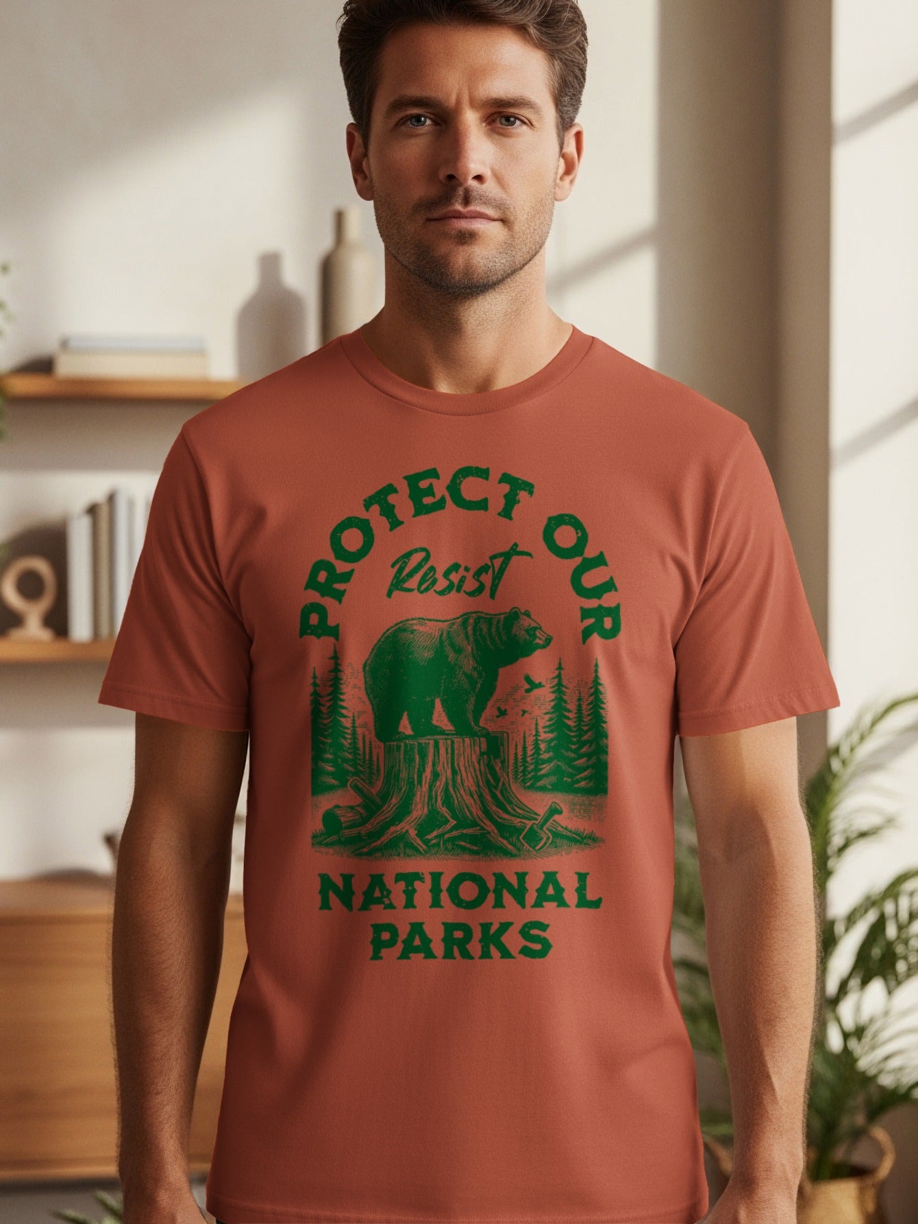 T-shirt with green graphic of bear on stump: "Protect Our National Parks."