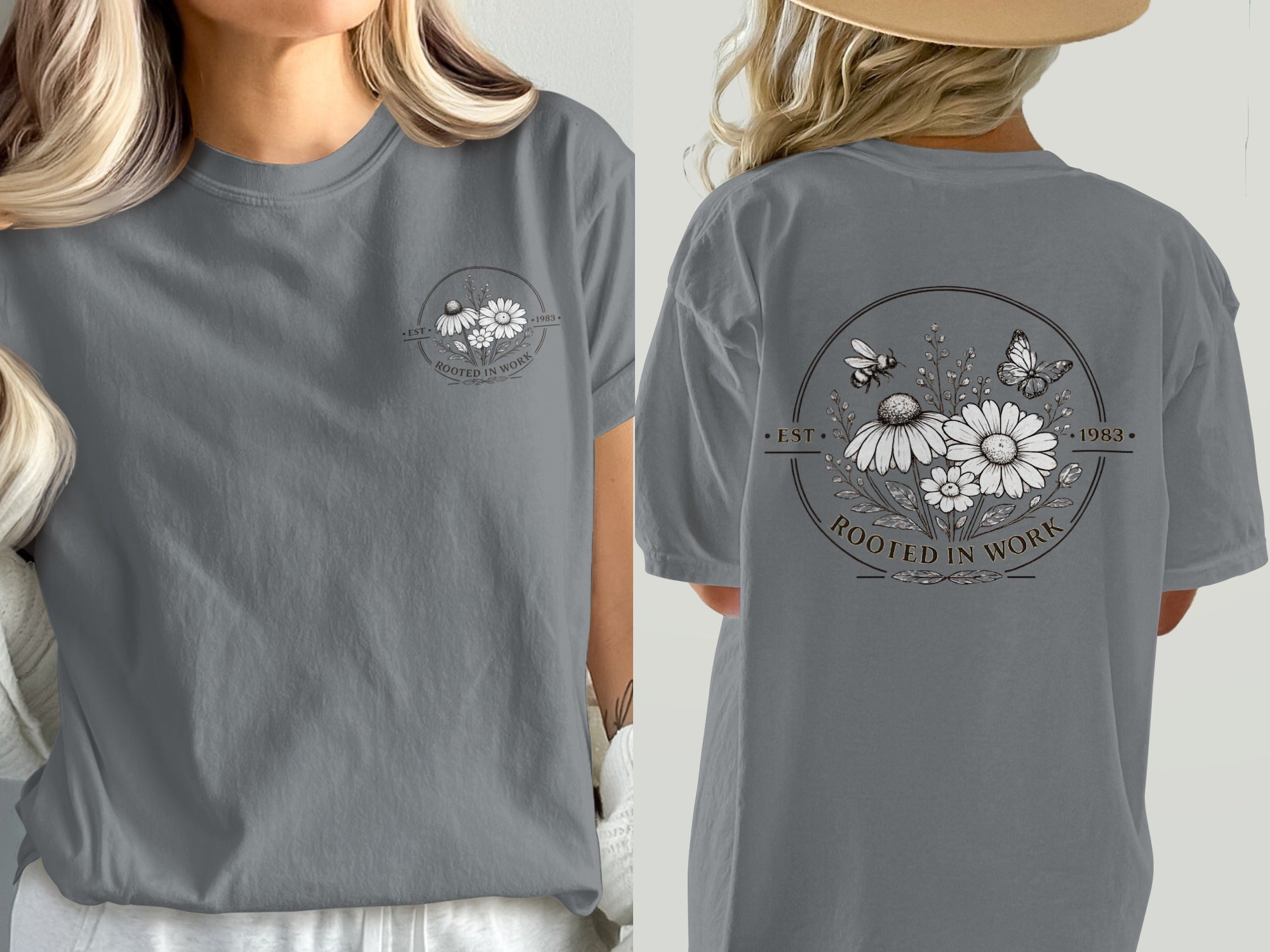 Gray t-shirt with round floral, bee, and butterfly graphic saying "ROOTED IN WORK, EST. 1983".