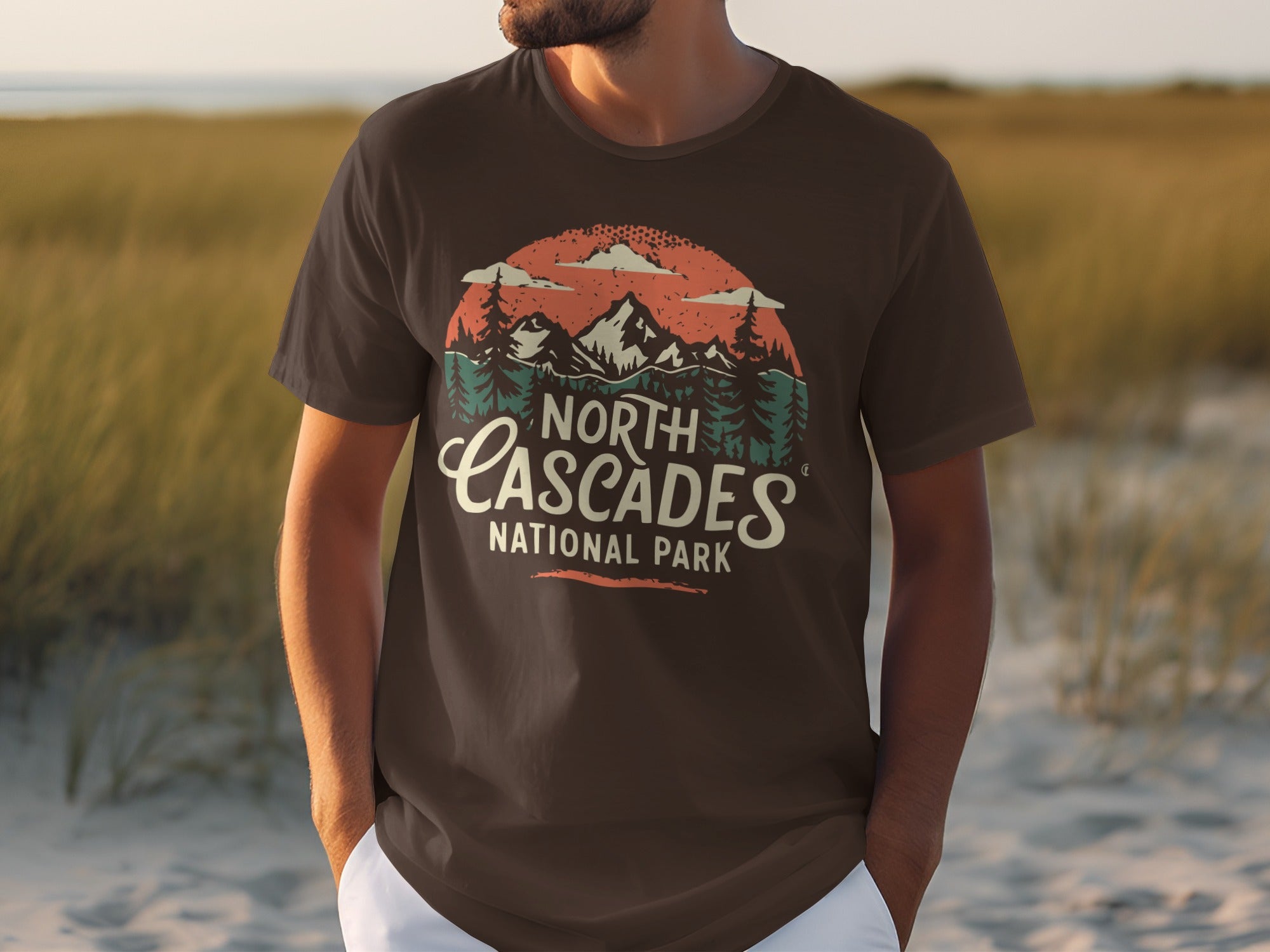Brown t-shirt with North Cascades National Park graphic of mountains and trees.