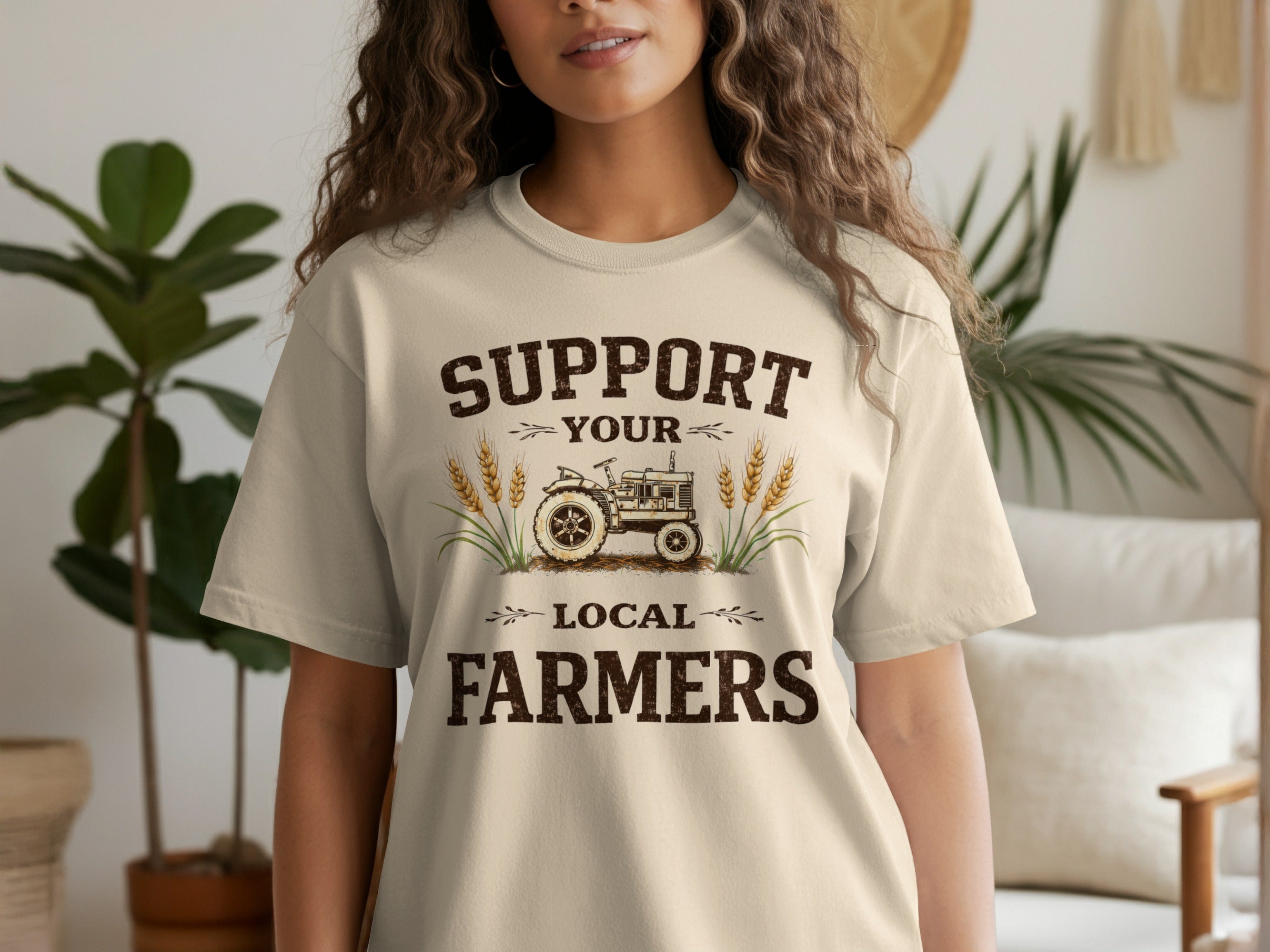 T-shirt with "Support Your Local Farmers" text, tractor, and wheat graphic.