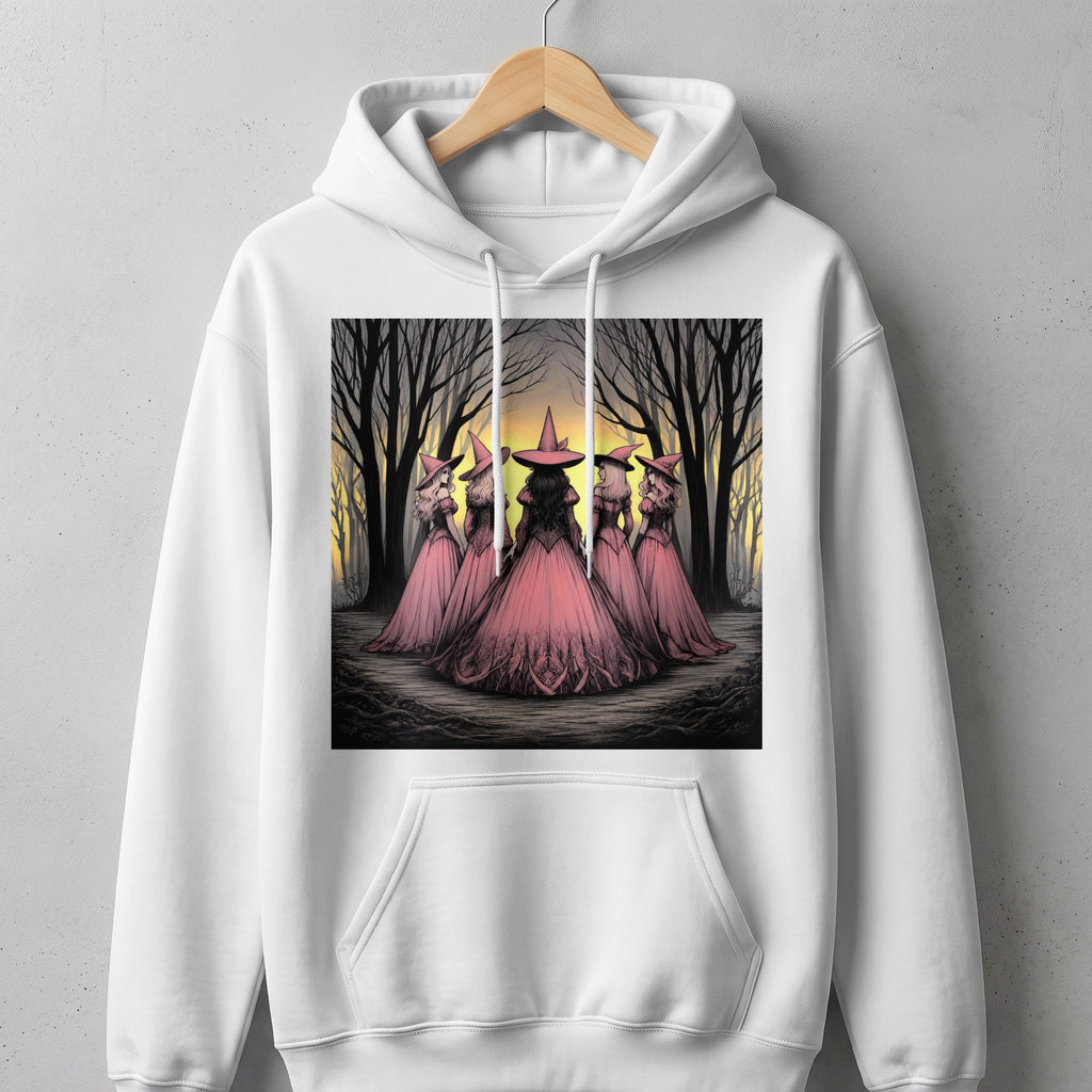 Five witches in pink gowns and hats stand in a spooky forest at dusk.