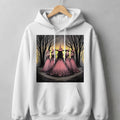 Five witches in pink gowns and hats stand in a spooky forest at dusk.