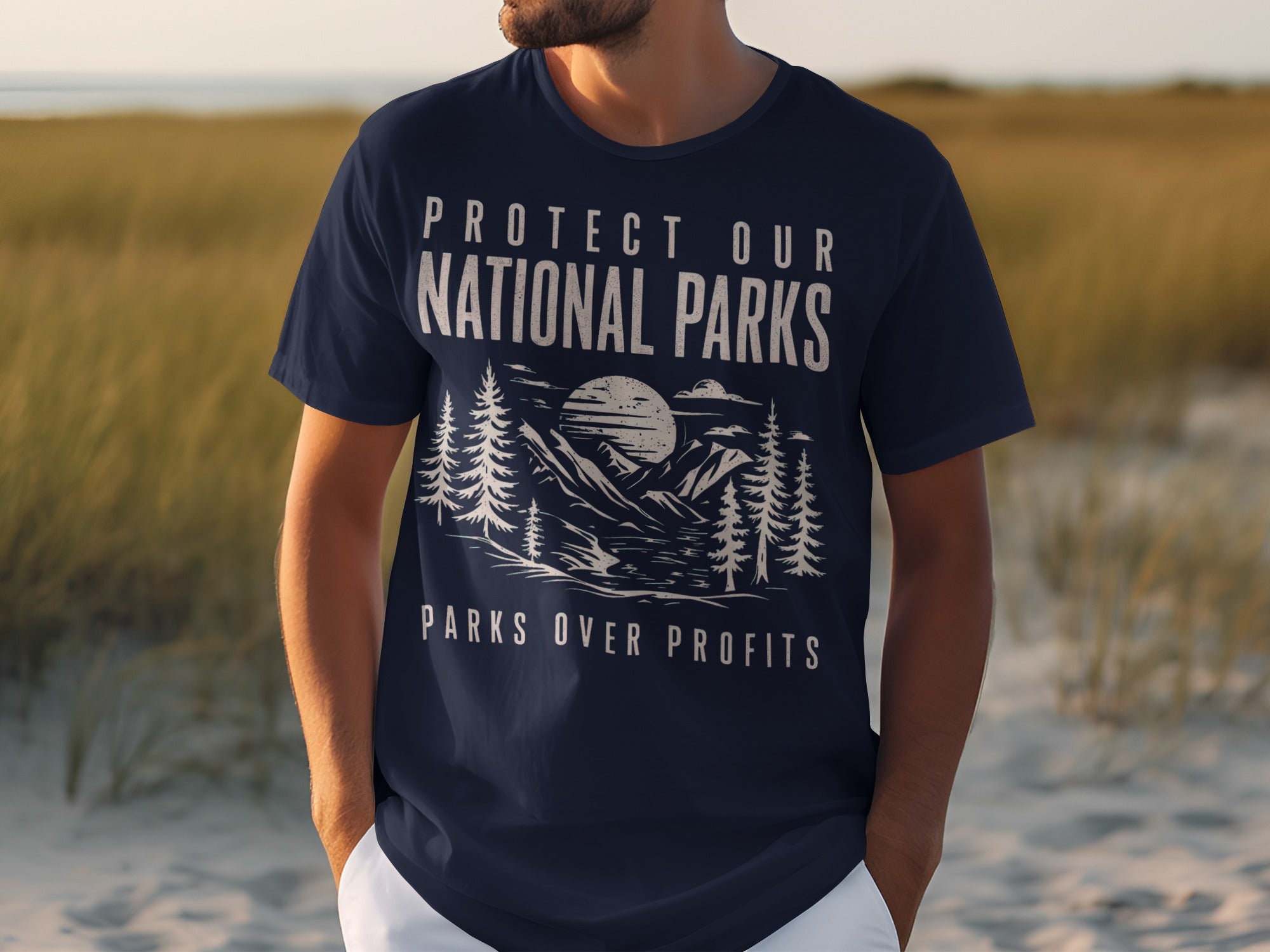 Navy t-shirt with "Protect Our National Parks Parks Over Profits" text and mountain graphic.