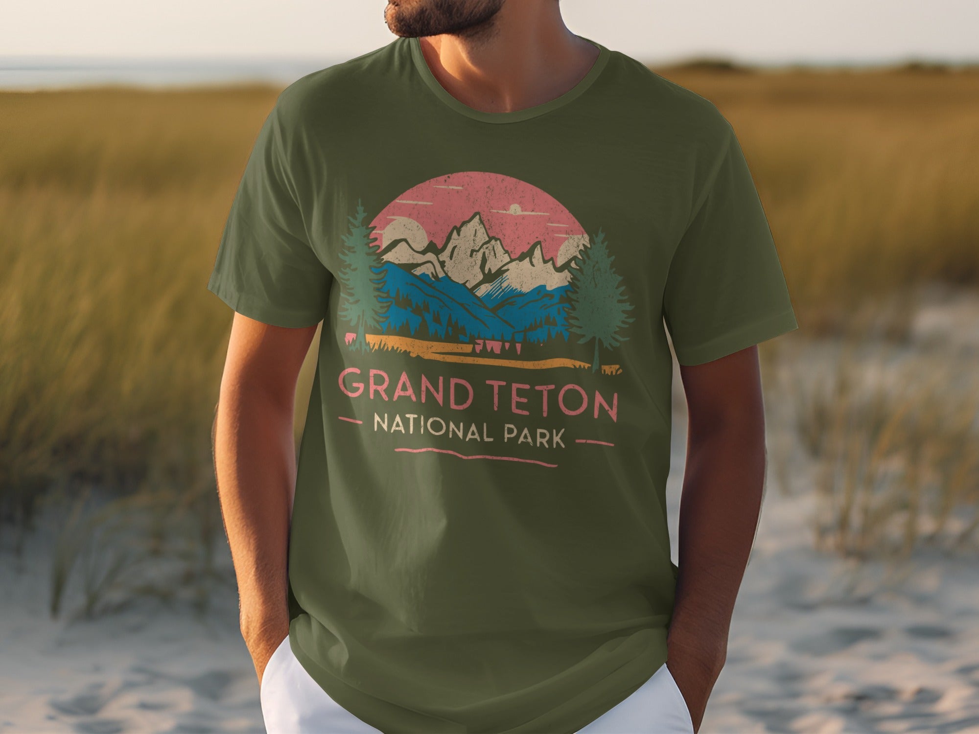 Olive green t-shirt with Grand Teton National Park graphic and text.