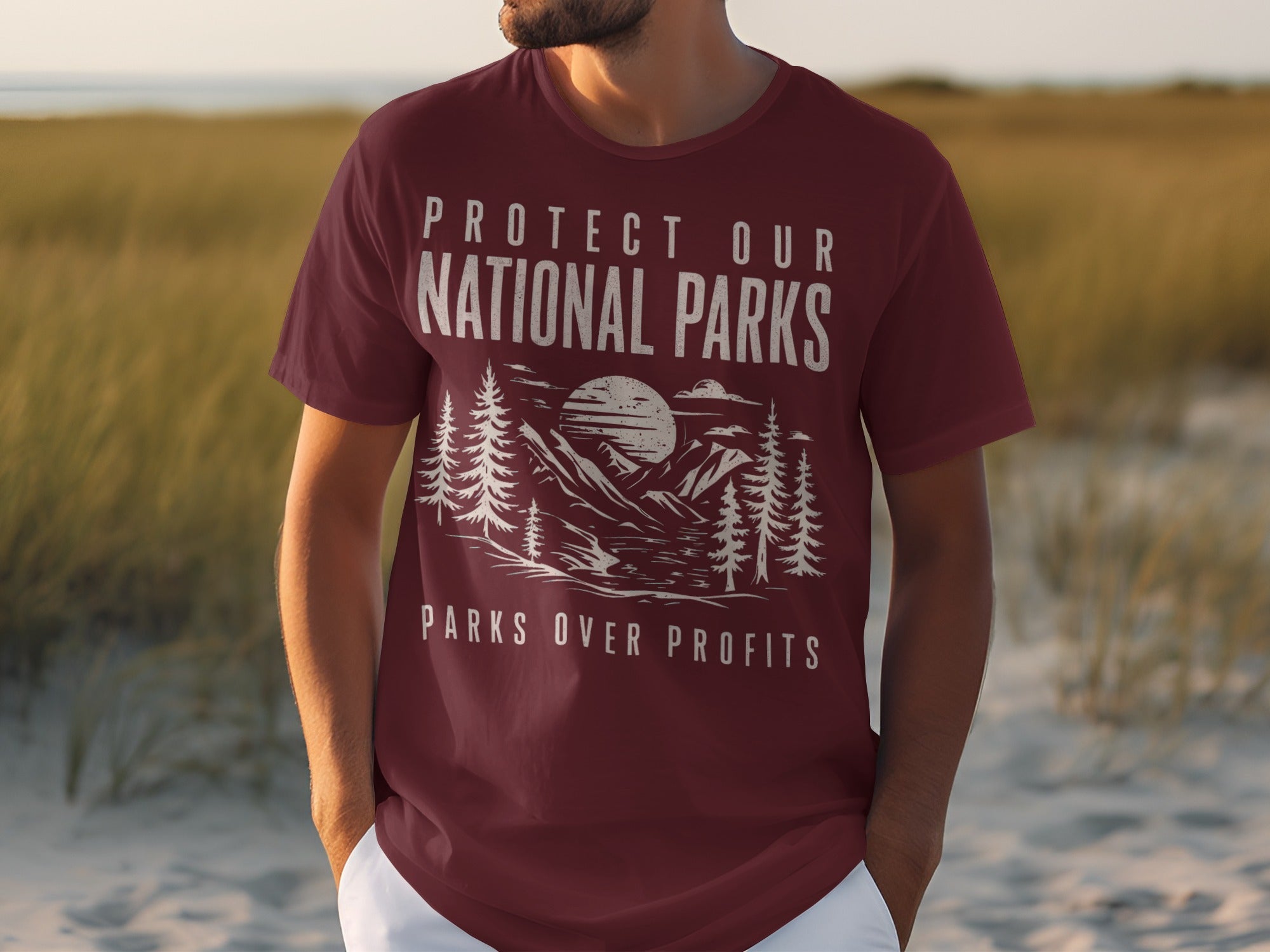 Maroon t-shirt with white text "PROTECT OUR NATIONAL PARKS" and mountain scene.