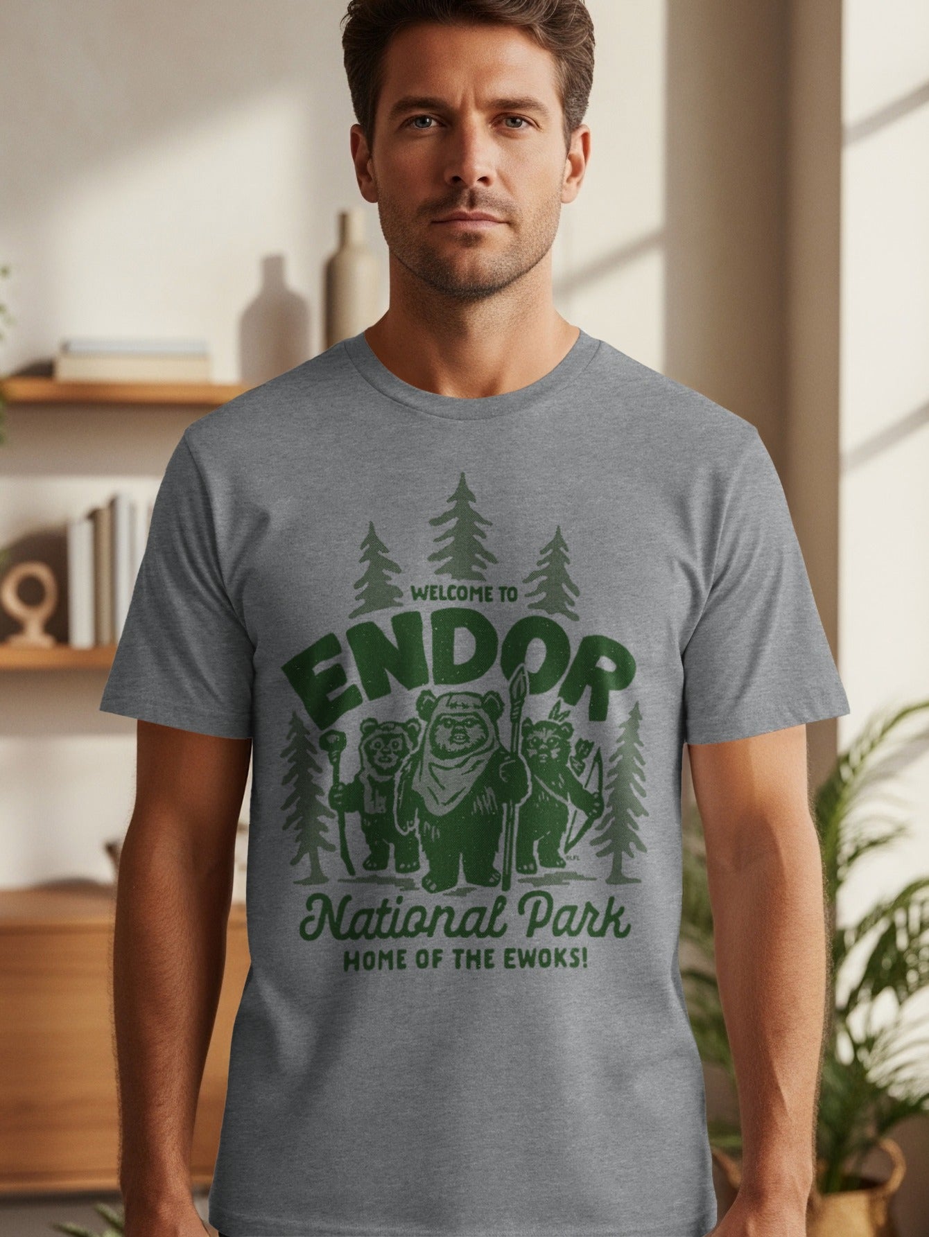 Grey t-shirt with green graphic: Welcome to Endor National Park, Home of the Ewoks.