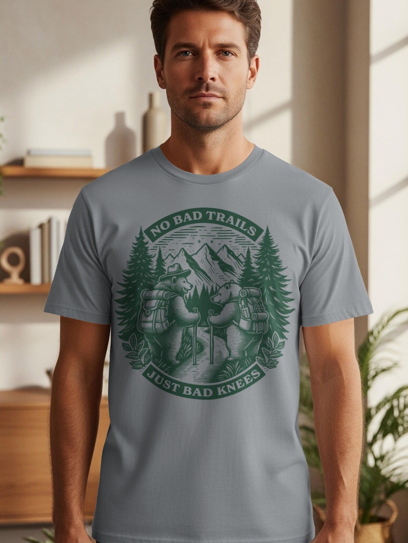 T-shirt graphic with bears hiking under the text "No Bad Trails Just Bad Knees."
