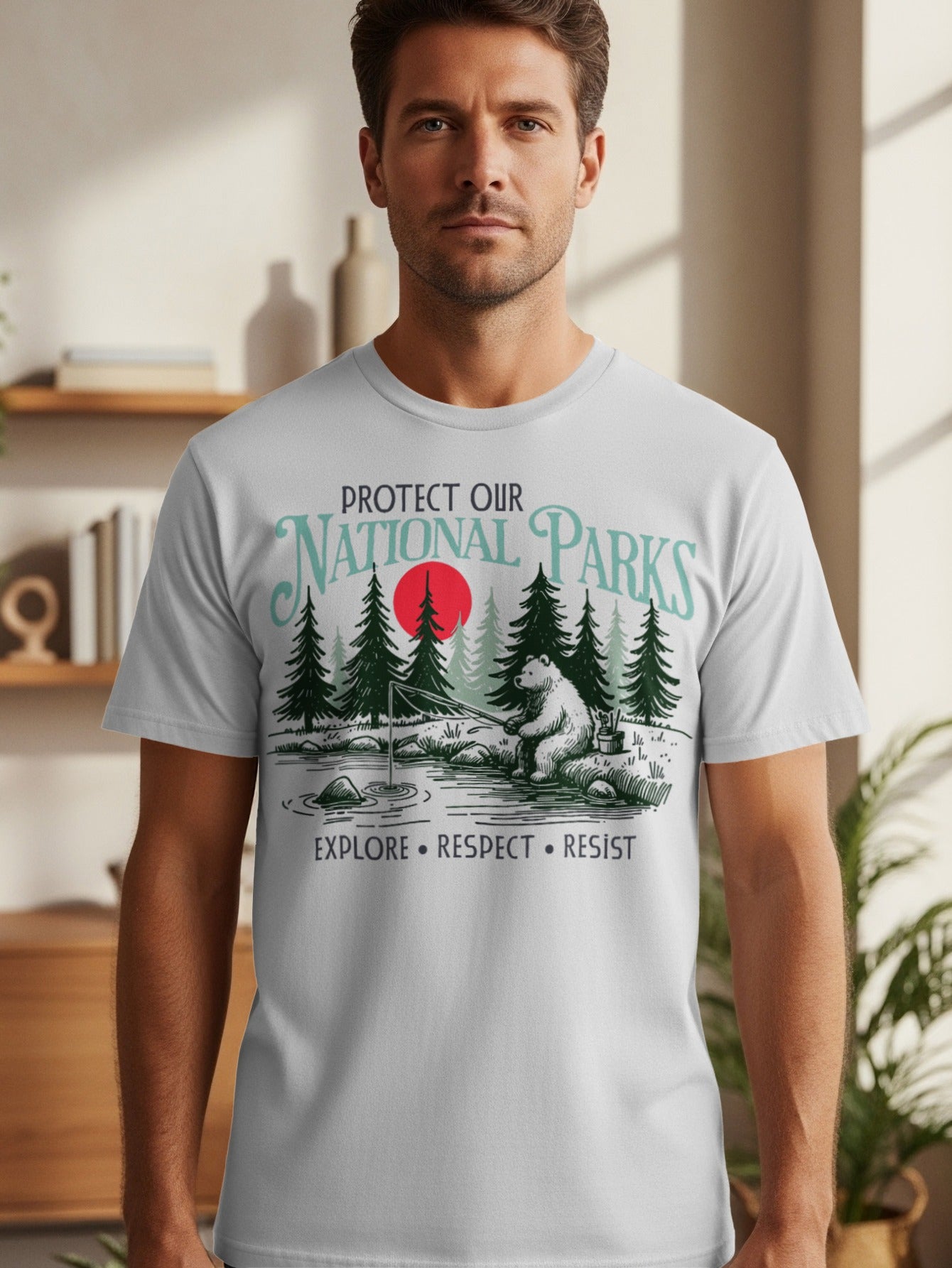 T-shirt graphic of "Protect Our National Parks" with a bear fishing beside trees and a red sun.