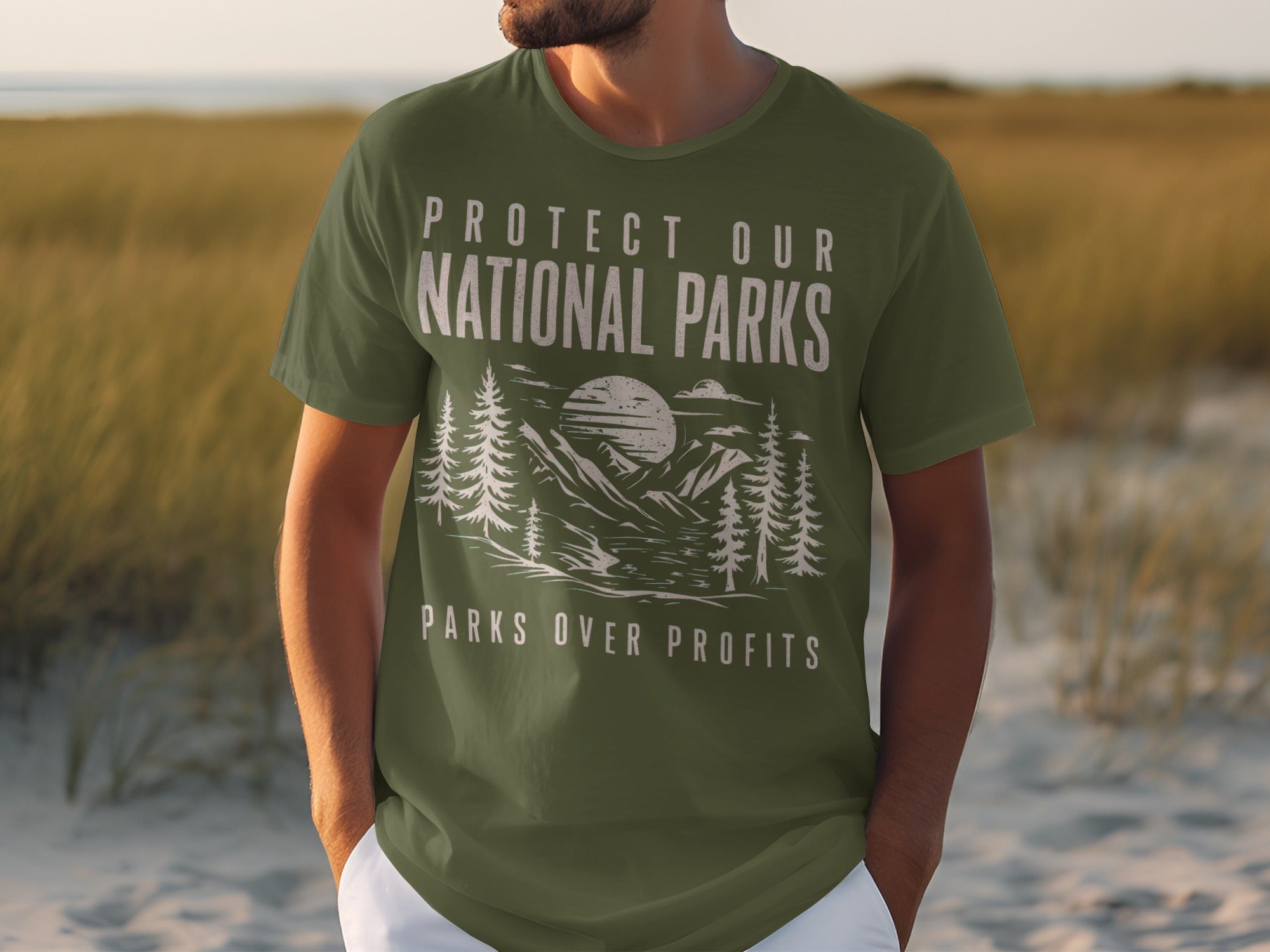 Green t-shirt with "PROTECT OUR NATIONAL PARKS" and "PARKS OVER PROFITS" text.