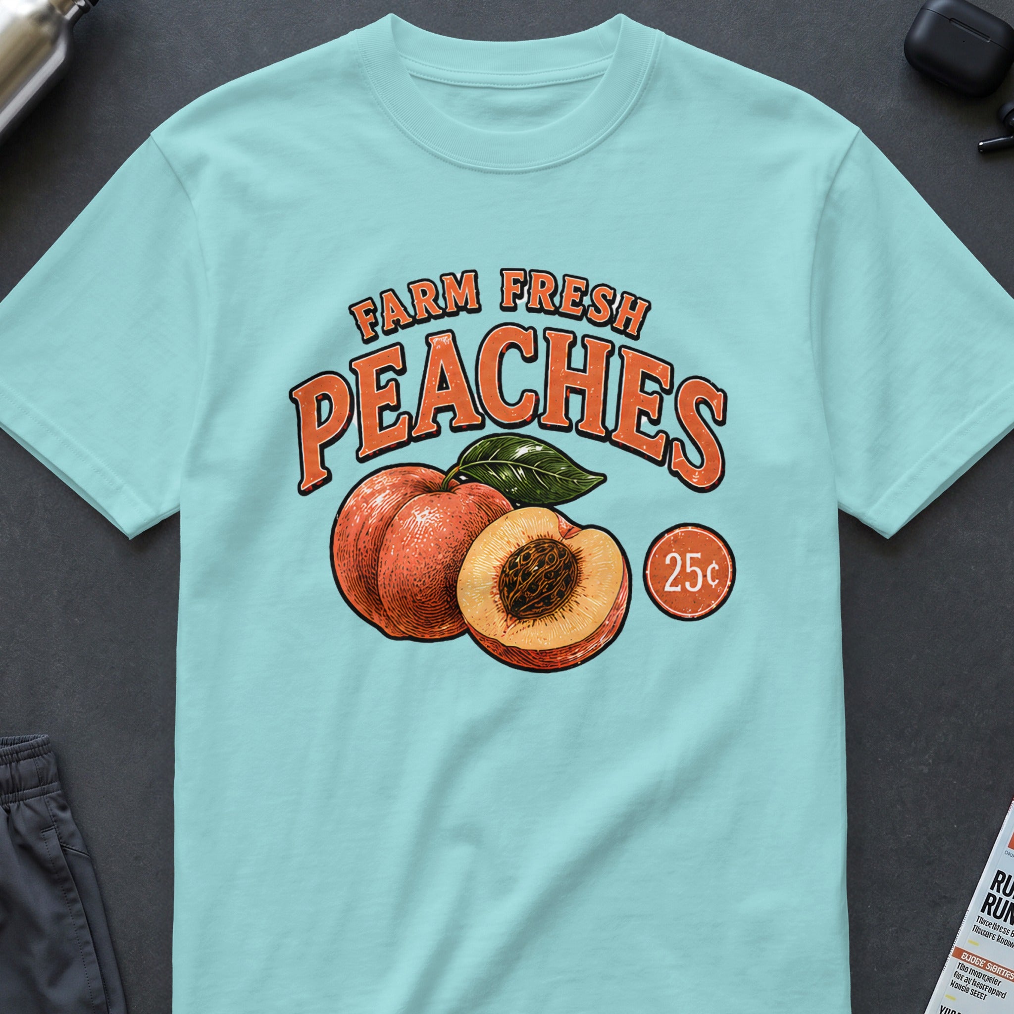Light blue t-shirt with "Farm Fresh Peaches" and 25 cent graphic.