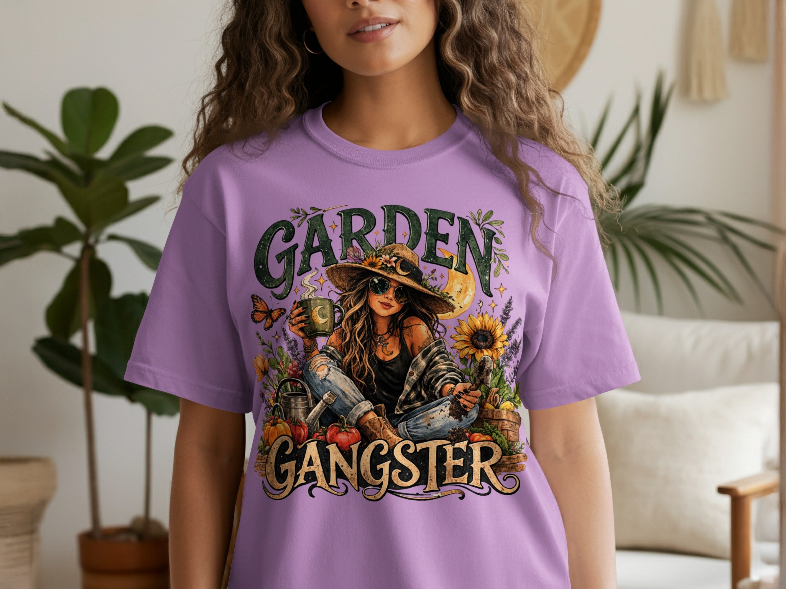 Purple t-shirt with "GARDEN GANGSTER" text and a woman with flowers and gardening tools.