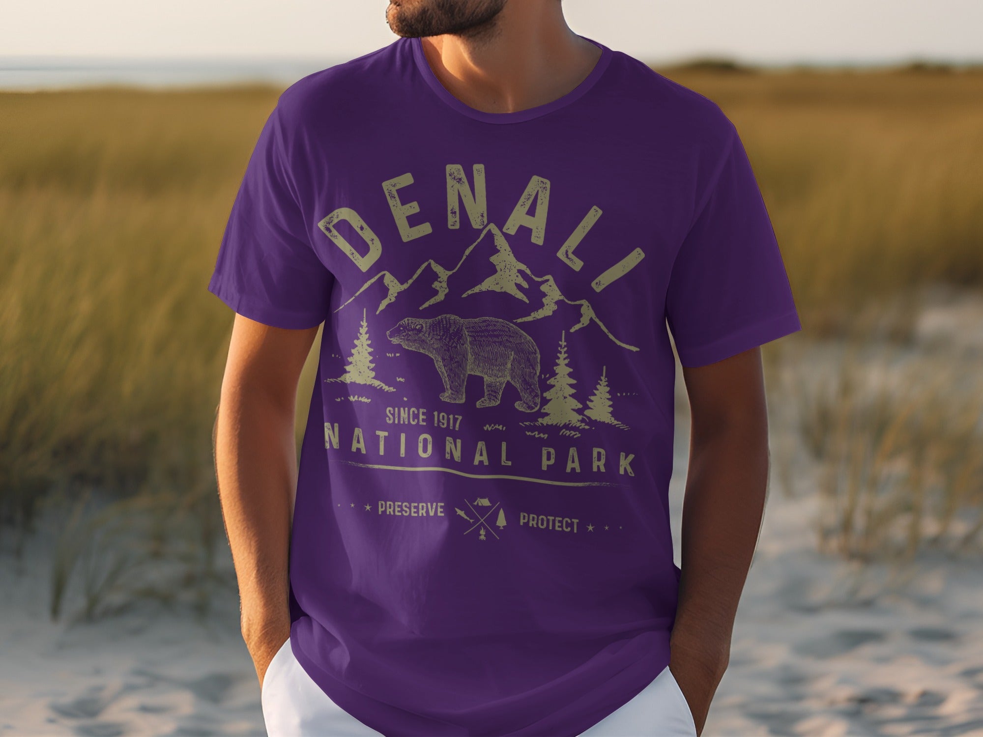 Purple t-shirt with "Denali National Park" graphic, bear, and mountains.