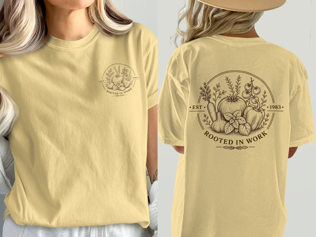 Yellow t-shirt with circular logo featuring vegetables, herbs, and text "Rooted in Work" and "Est. 1983".