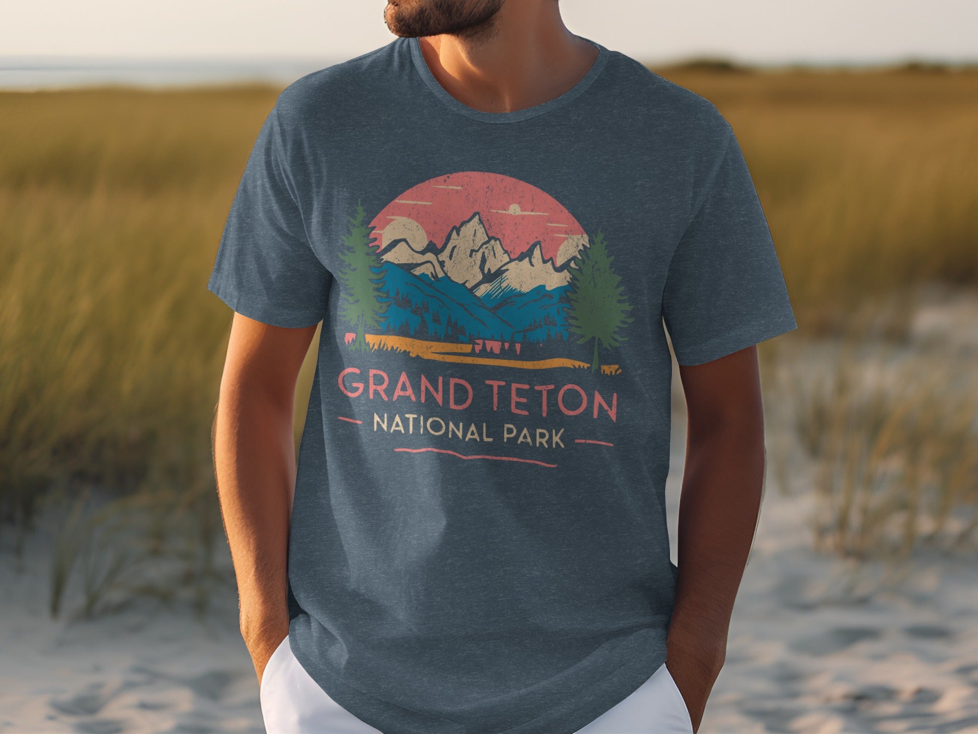 T-shirt with vintage Grand Teton National Park mountain sunset graphic.